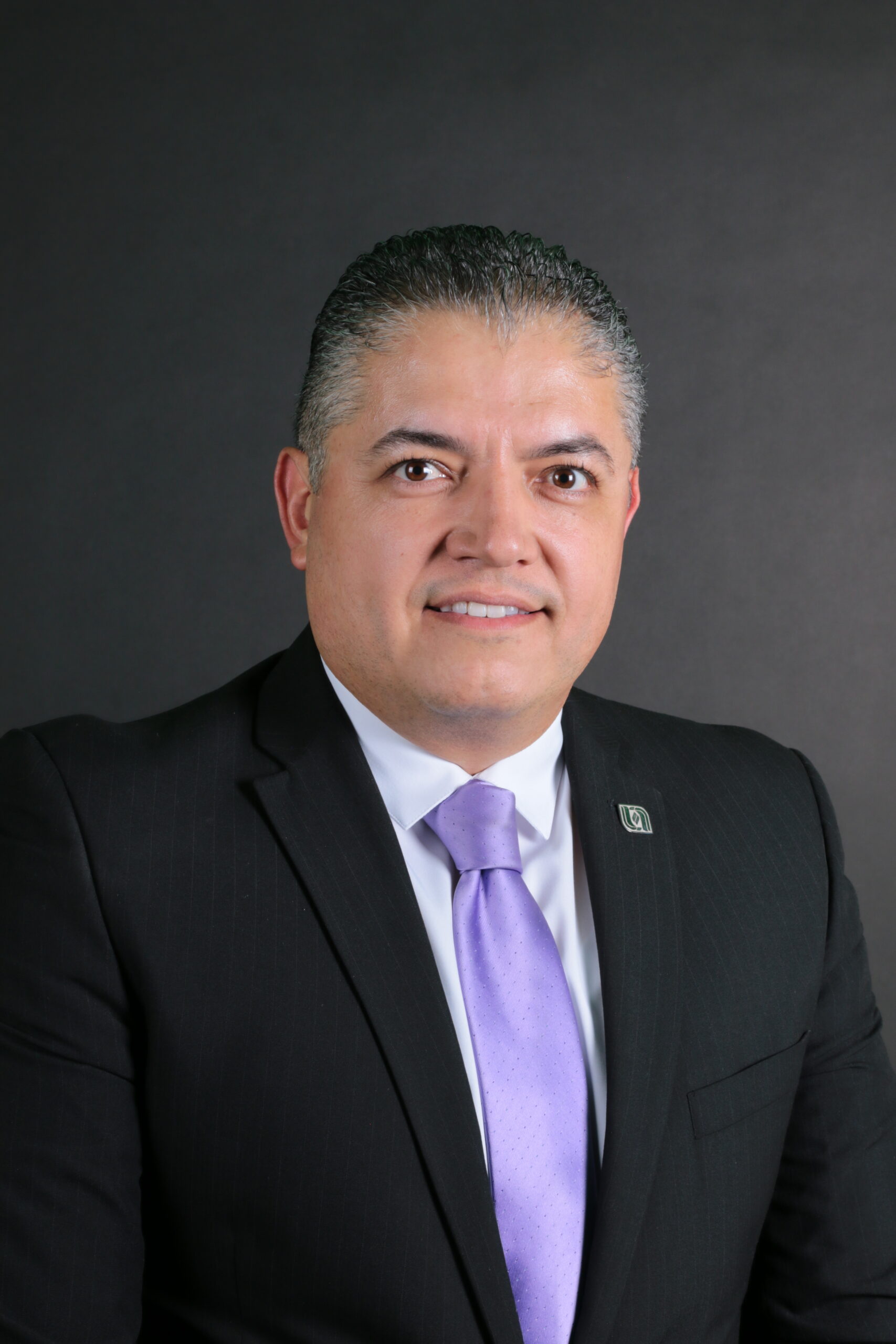 Dr. Miguel Ángel Veloz Romo